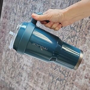 Reduce 40oz teal green with pewter bottom tumbler cup!